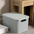 Plastic Box Shop extra large light blue storage basket with lid, featuring a woven texture and cut-out handles, ideal for modern homes.